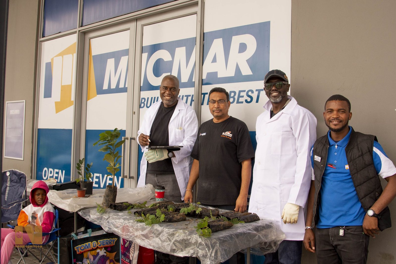 DIF team and Micmar staff at the seedling giveaway — group photo